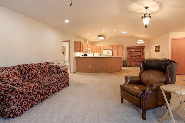 carpeted living room with lofted ceiling