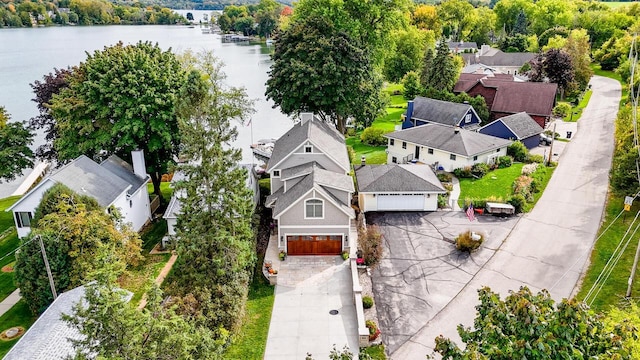 birds eye view of property featuring a water view