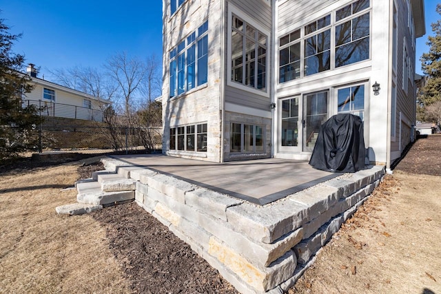 rear view of house with a patio area