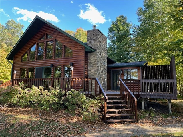 view of front of property with a wooden deck