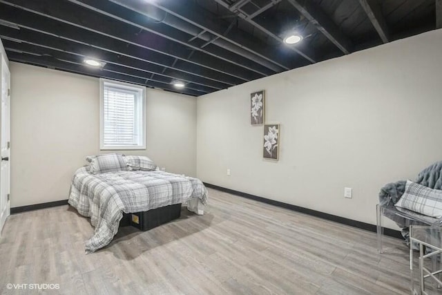 bedroom featuring hardwood / wood-style floors