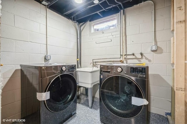 laundry room with washer and dryer