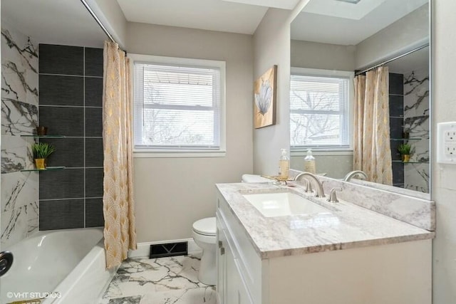 full bathroom with shower / tub combo with curtain, vanity, and toilet