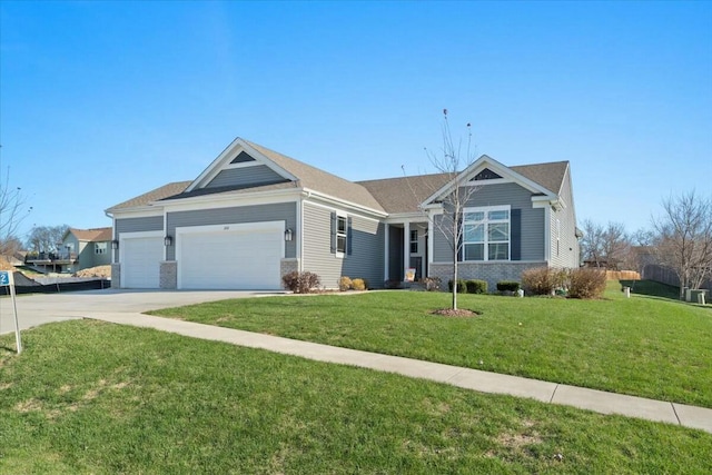 ranch-style home with a garage and a front yard