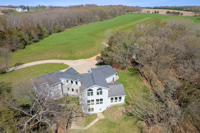 birds eye view of property with a rural view