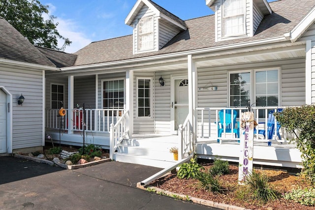 entrance to property with a porch