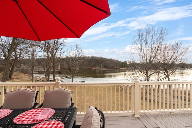 deck featuring a water view