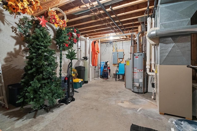 basement with gas water heater and heating unit