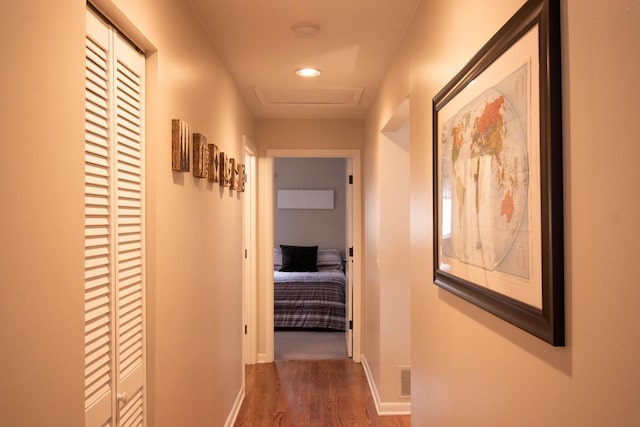 hall with dark hardwood / wood-style floors