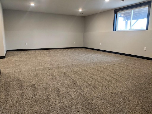 empty room featuring carpet flooring