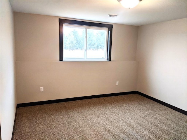 view of carpeted spare room