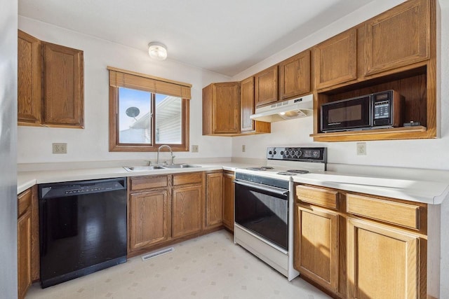 kitchen with sink and black appliances