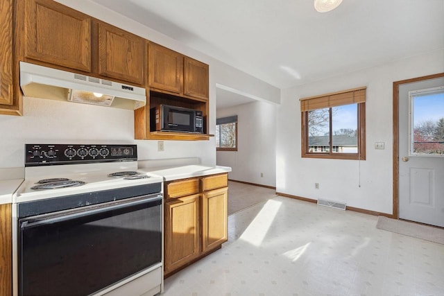 kitchen featuring range with electric cooktop