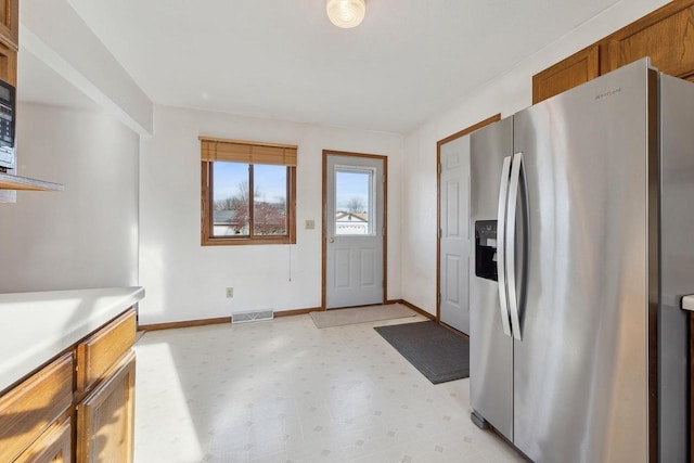 kitchen with stainless steel fridge