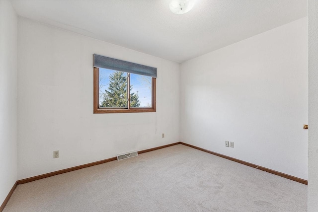 empty room with carpet floors