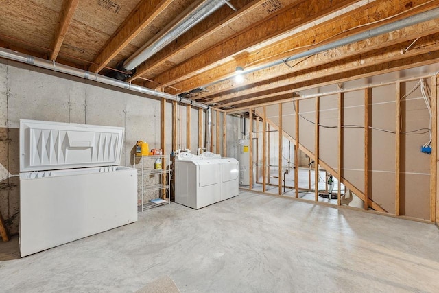 basement with water heater, washing machine and dryer, and fridge