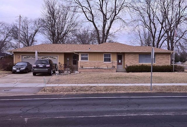 ranch-style house featuring a garage