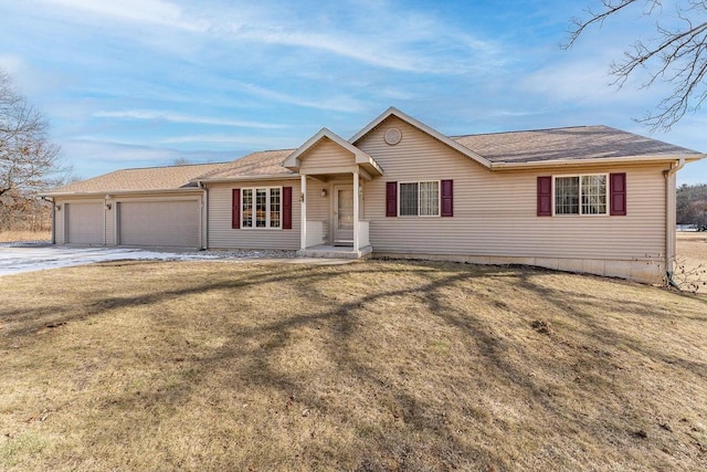 single story home featuring a garage and a front lawn