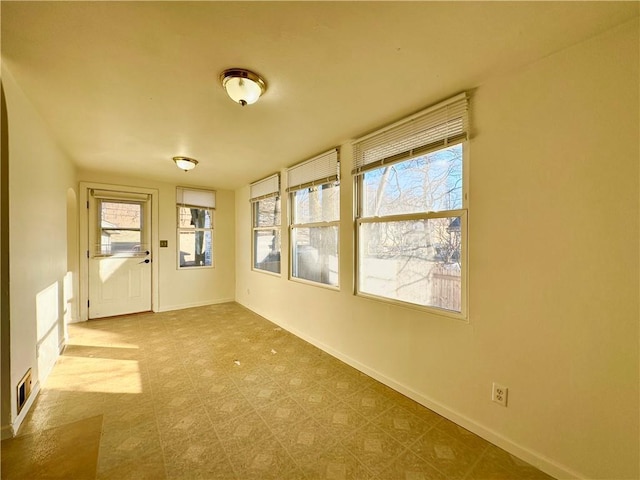 view of unfurnished sunroom