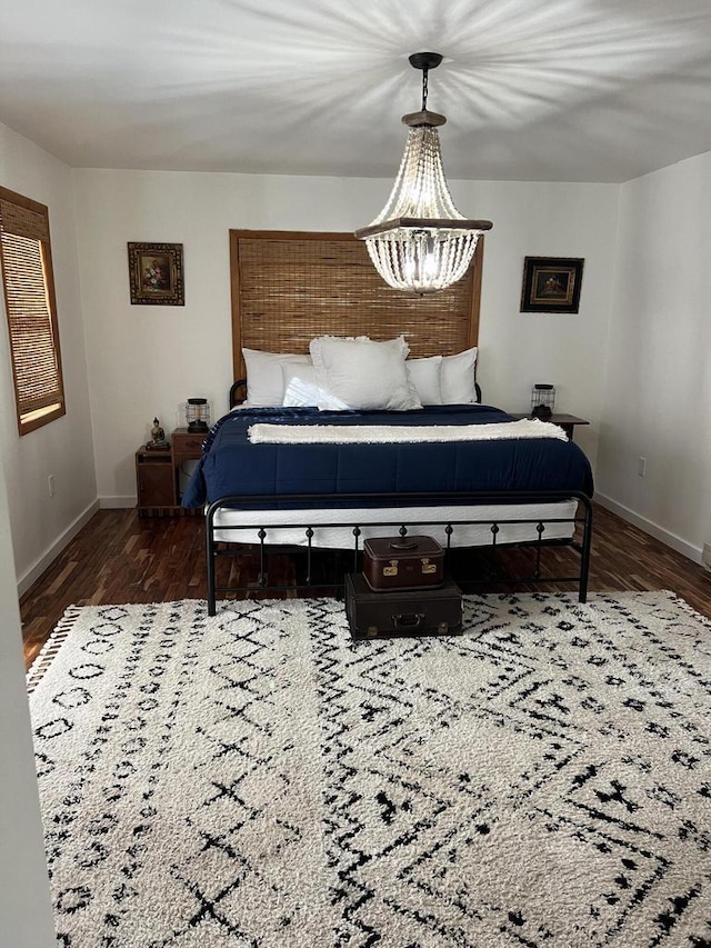 bedroom featuring dark wood-type flooring