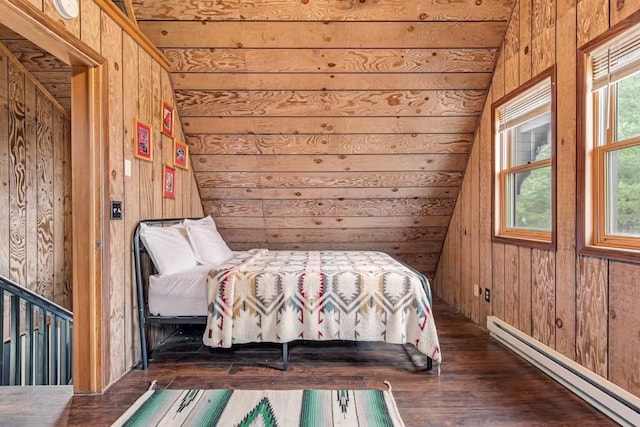 unfurnished bedroom featuring dark hardwood / wood-style floors, a baseboard radiator, and wooden walls