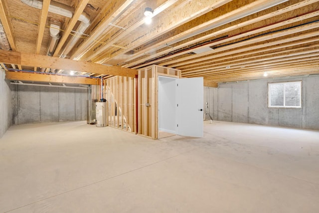 basement featuring water heater