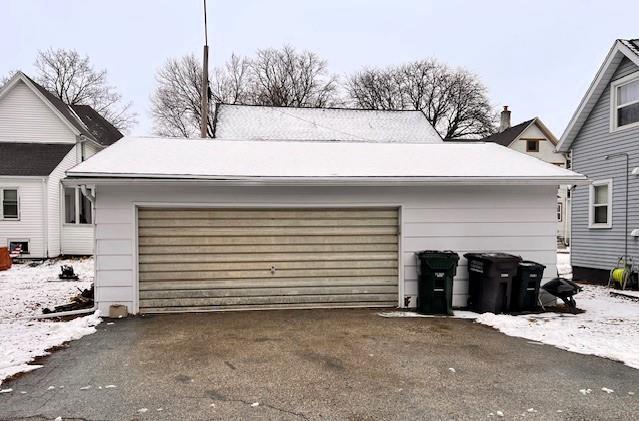 view of snow covered garage