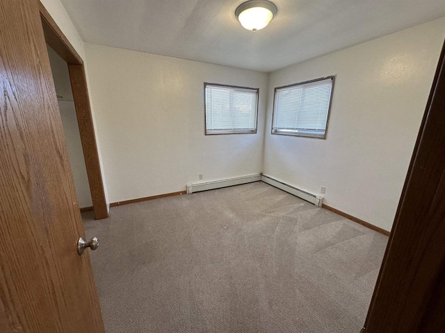 unfurnished bedroom featuring light carpet