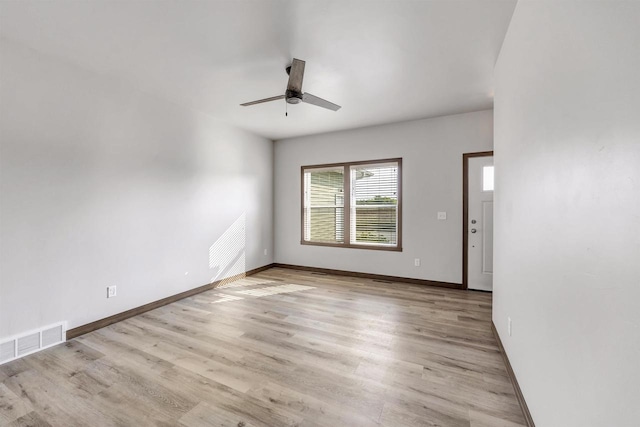 unfurnished room featuring ceiling fan and light hardwood / wood-style floors