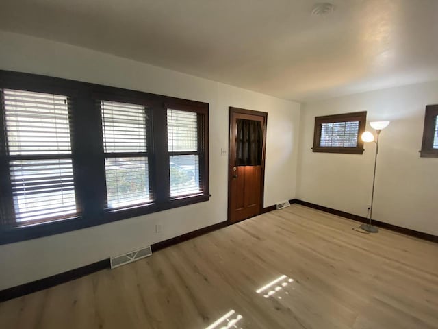 foyer entrance featuring hardwood / wood-style flooring