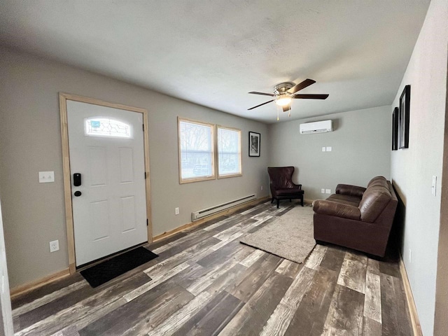 entrance foyer featuring a baseboard radiator, dark wood-type flooring, a wall mounted AC, and ceiling fan