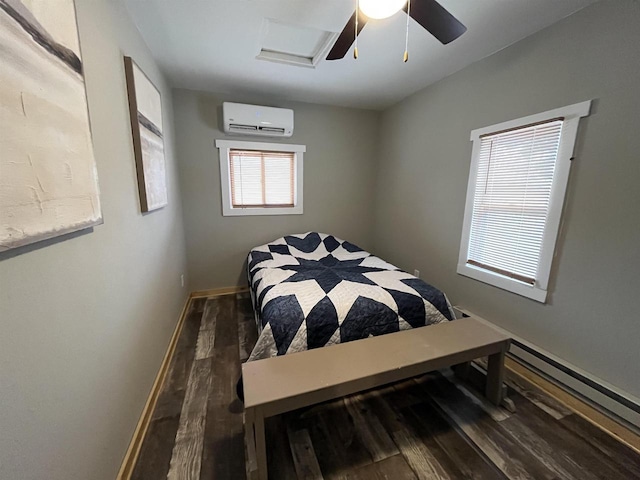 bedroom featuring a wall mounted air conditioner, dark hardwood / wood-style floors, and ceiling fan