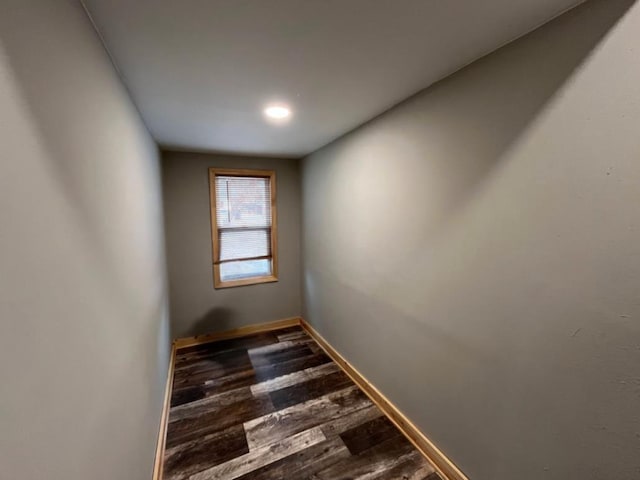 empty room with wood-type flooring