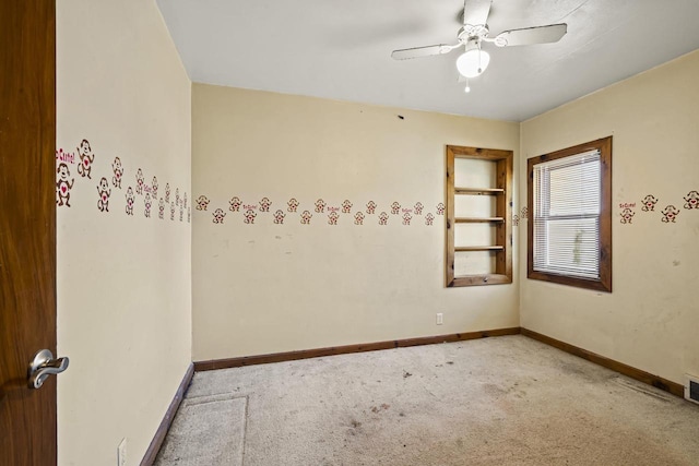 empty room with light carpet and ceiling fan