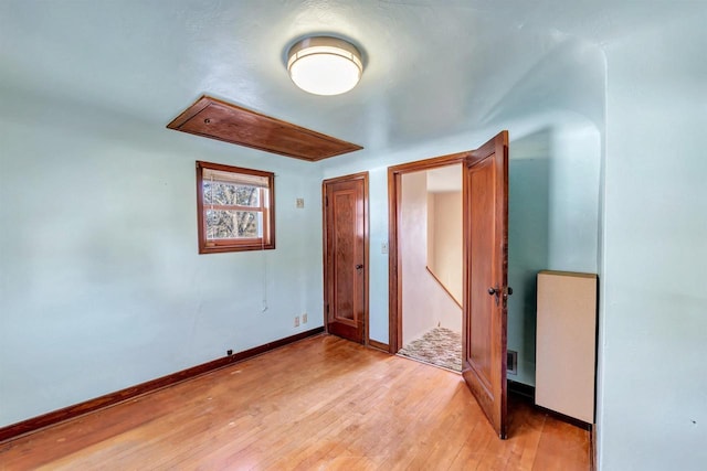 unfurnished bedroom featuring light hardwood / wood-style floors