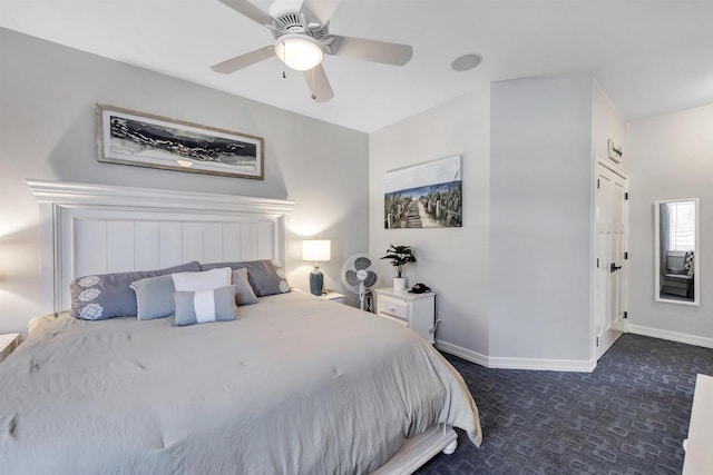 carpeted bedroom with ceiling fan