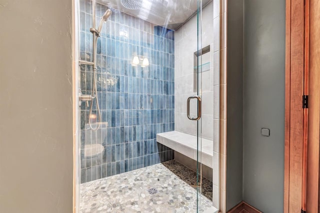 bathroom featuring an enclosed shower