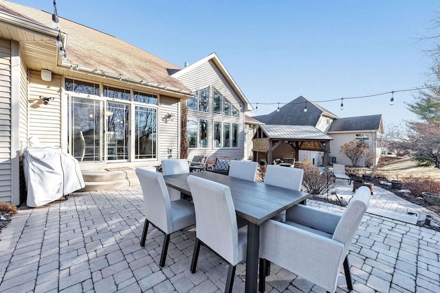 view of patio featuring a grill