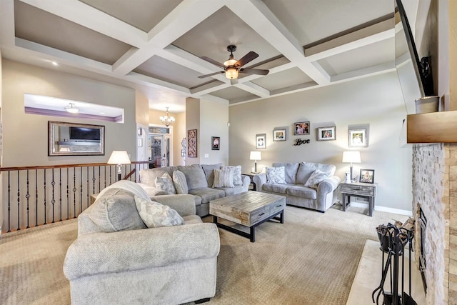 carpeted living room with coffered ceiling, a fireplace, and beam ceiling