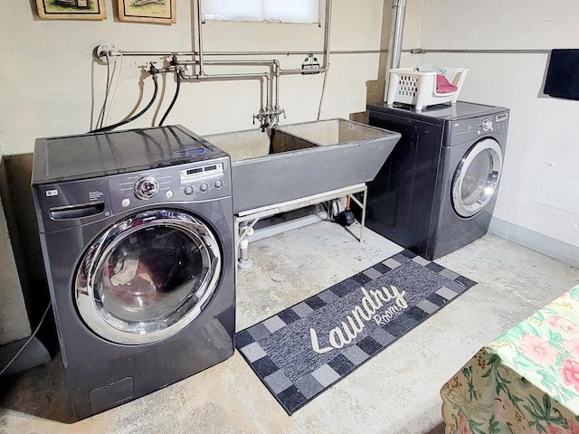 laundry area with washer and clothes dryer