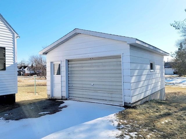 view of snow covered garage