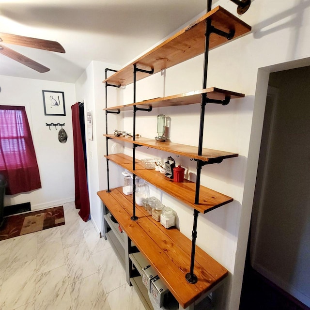 interior space featuring ceiling fan