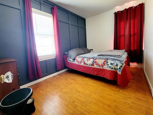 bedroom featuring hardwood / wood-style floors