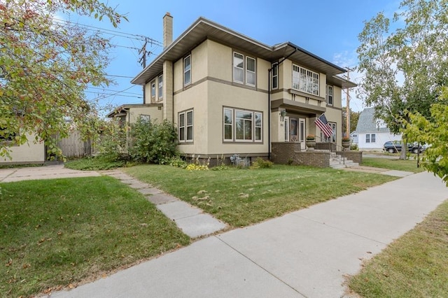 view of front of home with a front yard