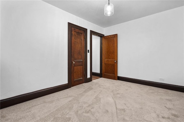 spare room with carpet floors