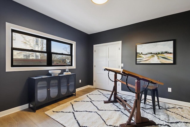 home office with light wood-type flooring