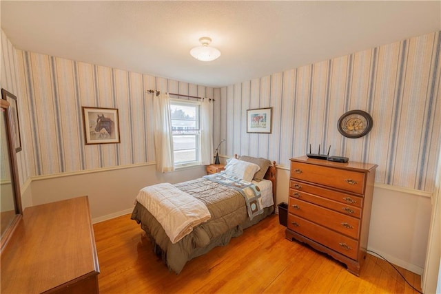 bedroom with light hardwood / wood-style flooring