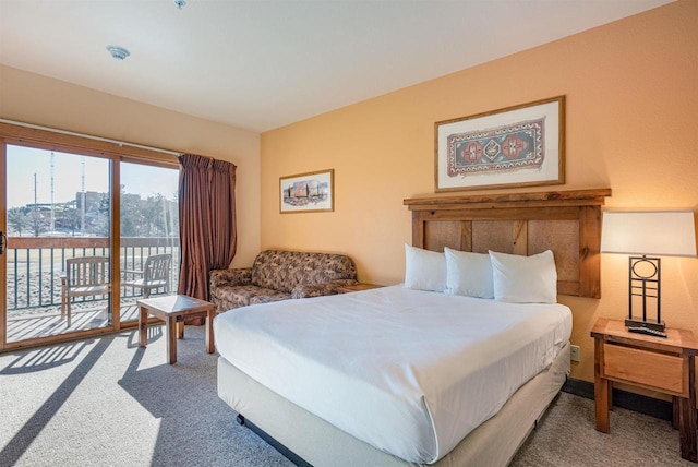 bedroom featuring carpet floors and access to outside