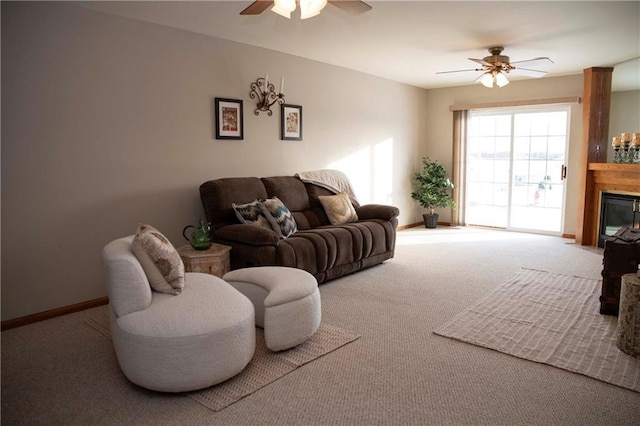 living room with carpet flooring and ceiling fan