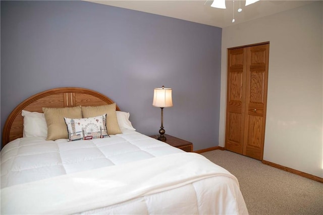 bedroom with ceiling fan and carpet